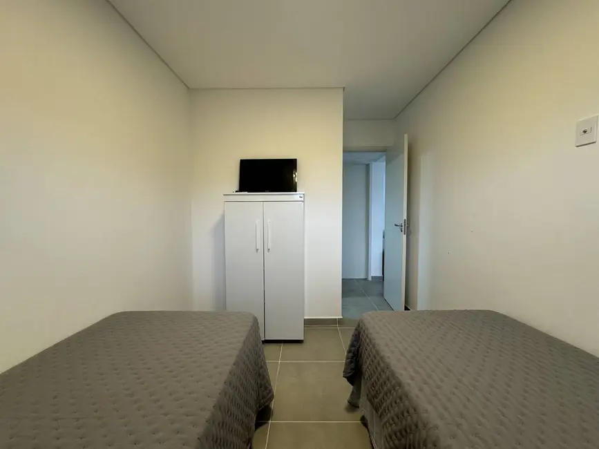 Foto 2 de Apartamento com 2 quartos à venda e para alugar, 70m2 em Ubatuba - SP