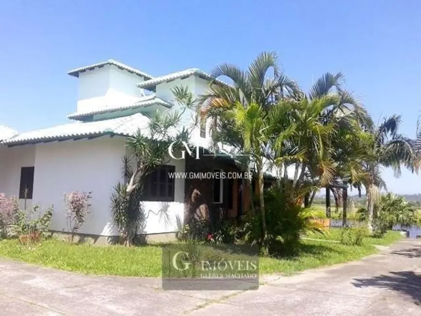 Casa com 4 quartos à venda, 260m2 em Torres - RS - imagem 4 Foto 4 de Casa com 4 quartos à venda, 260m2 em Torres - RS