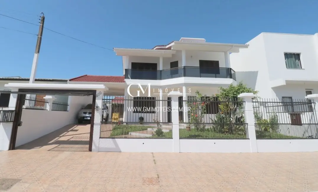 Foto 2 de Casa com 4 quartos à venda, 260m2 em Centro, Torres - RS