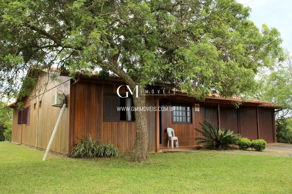 Casa com 4 quartos à venda, 200m2 em Torres - RS - imagem 1 Foto 1 de Casa com 4 quartos à venda, 200m2 em Torres - RS