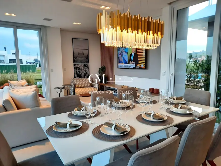 Foto 7 de Casa de Condomínio com 4 quartos à venda, 337m2 em Torres - RS