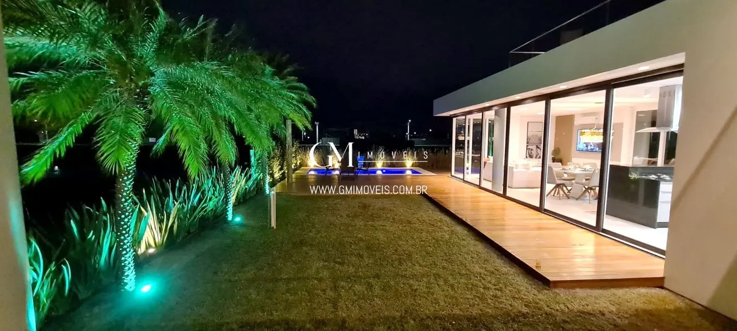 Foto 3 de Casa de Condomínio com 4 quartos à venda, 337m2 em Torres - RS