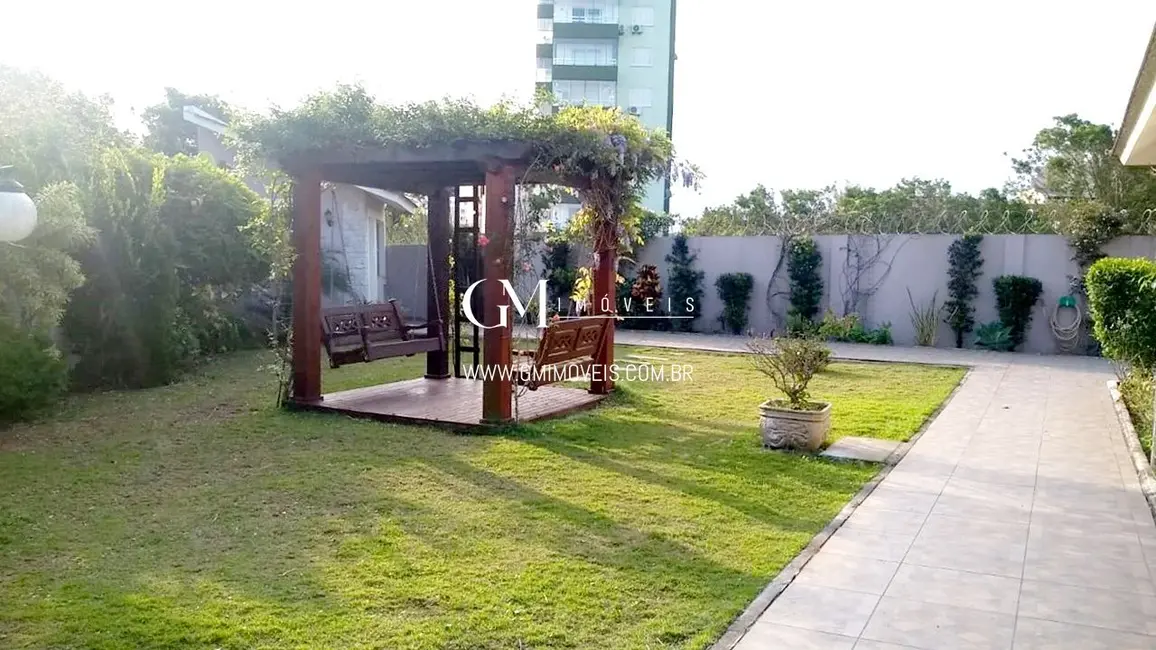 Foto 6 de Casa com 3 quartos à venda, 243m2 em Centro, Torres - RS