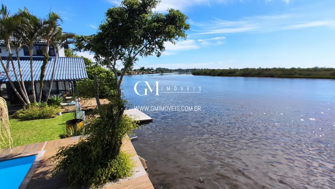 Foto 9 de Casa com 5 quartos à venda, 162m2 em Torres - RS