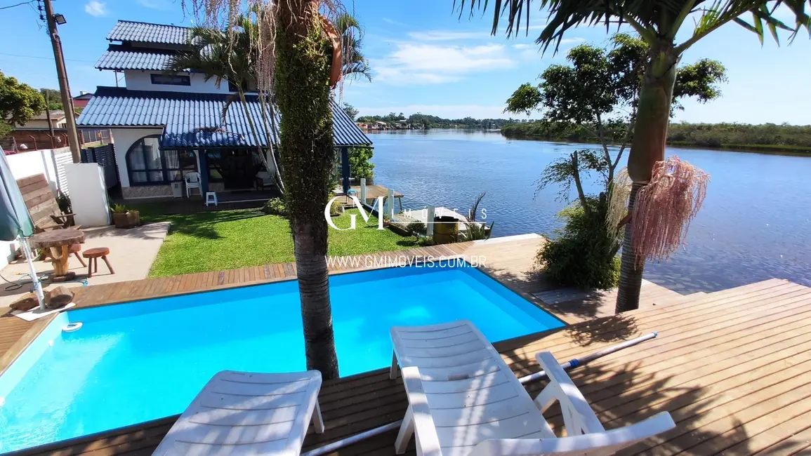 Foto 7 de Casa com 5 quartos à venda, 162m2 em Torres - RS