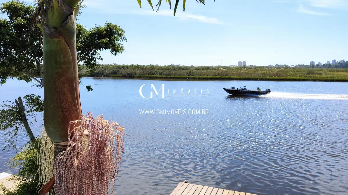 Foto 8 de Casa com 5 quartos à venda, 162m2 em Torres - RS