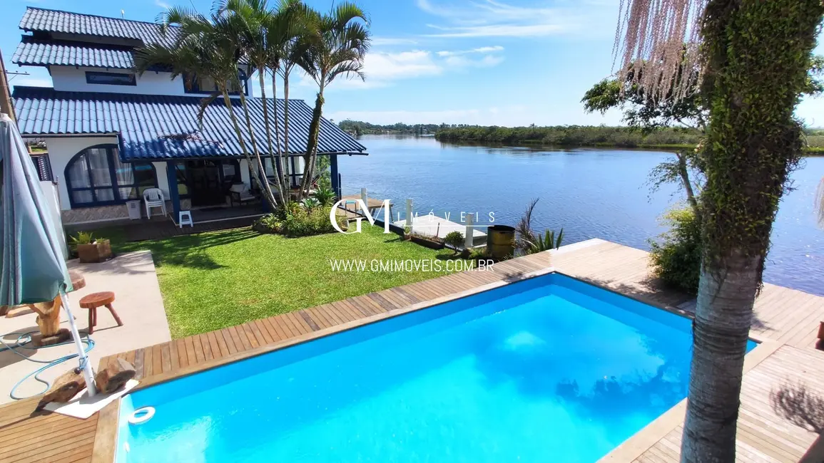 Foto 6 de Casa com 5 quartos à venda, 162m2 em Torres - RS