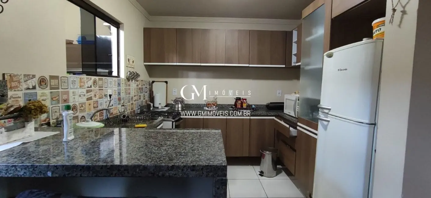 Foto 7 de Casa com 3 quartos à venda, 142m2 em Torres - RS