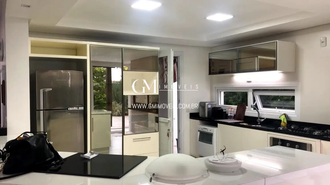 Foto 3 de Casa com 3 quartos à venda, 210m2 em Torres - RS