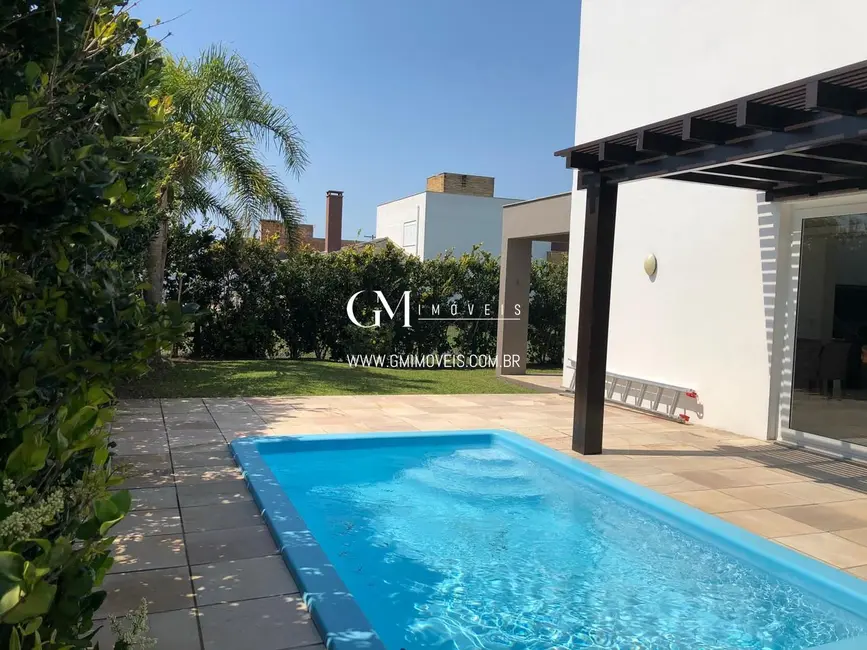 Foto 6 de Casa com 3 quartos à venda, 210m2 em Torres - RS