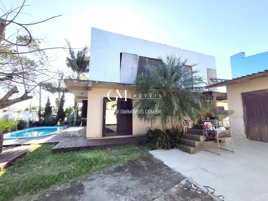 Foto 1 de Casa com 6 quartos à venda, 160m2 em Torres - RS