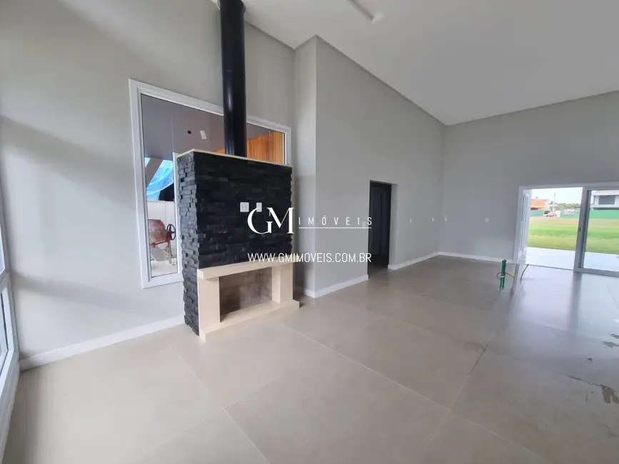 Foto 7 de Casa de Condomínio com 3 quartos à venda, 240m2 em Torres - RS