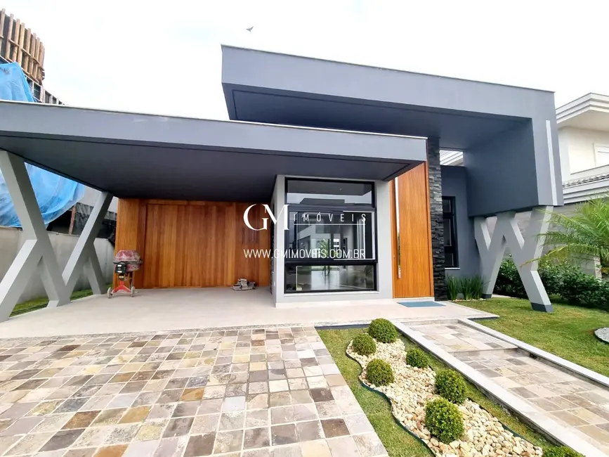 Foto 2 de Casa de Condomínio com 3 quartos à venda, 240m2 em Torres - RS