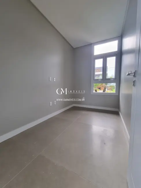 Foto 9 de Casa de Condomínio com 3 quartos à venda, 240m2 em Torres - RS