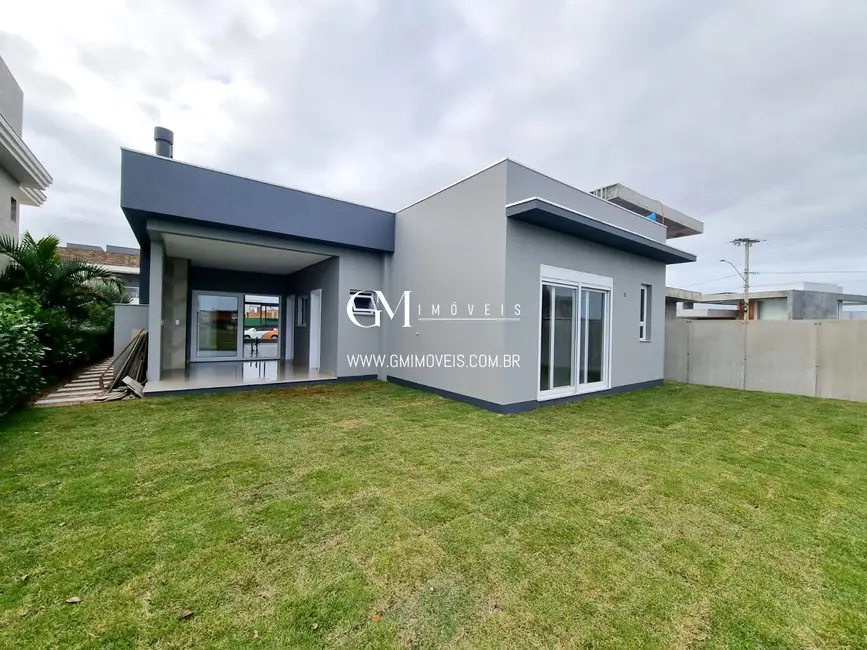 Foto 3 de Casa de Condomínio com 3 quartos à venda, 240m2 em Torres - RS