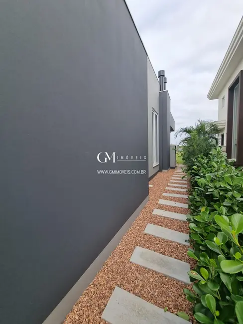 Foto 4 de Casa de Condomínio com 3 quartos à venda, 240m2 em Torres - RS