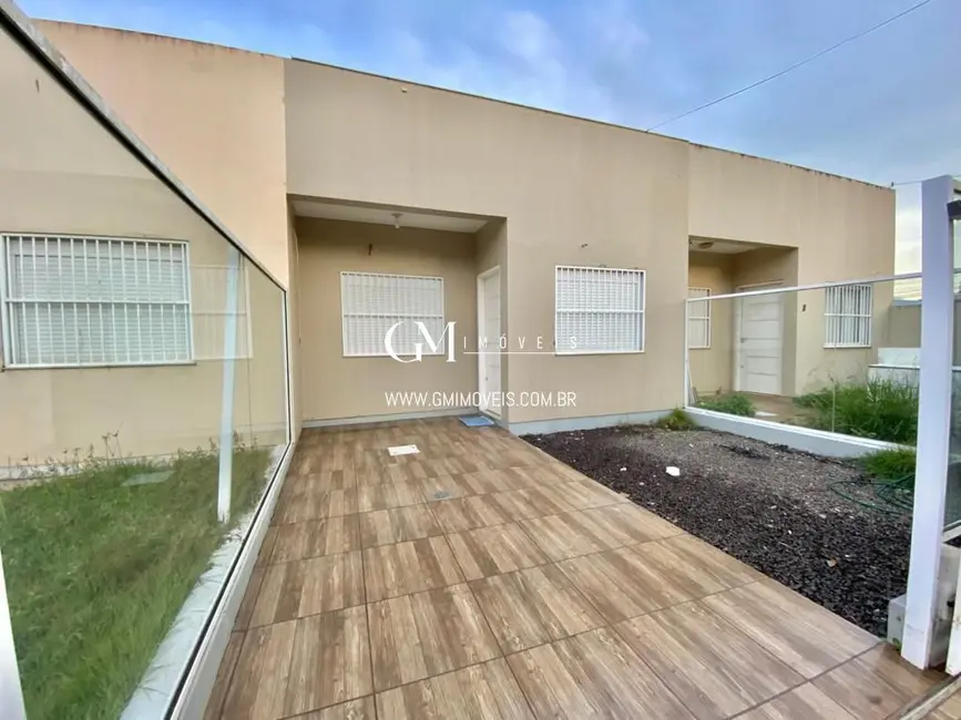 Casa com 2 quartos à venda, 90m2 em Torres - RS - imagem 1 Foto 1 de Casa com 2 quartos à venda, 90m2 em Torres - RS