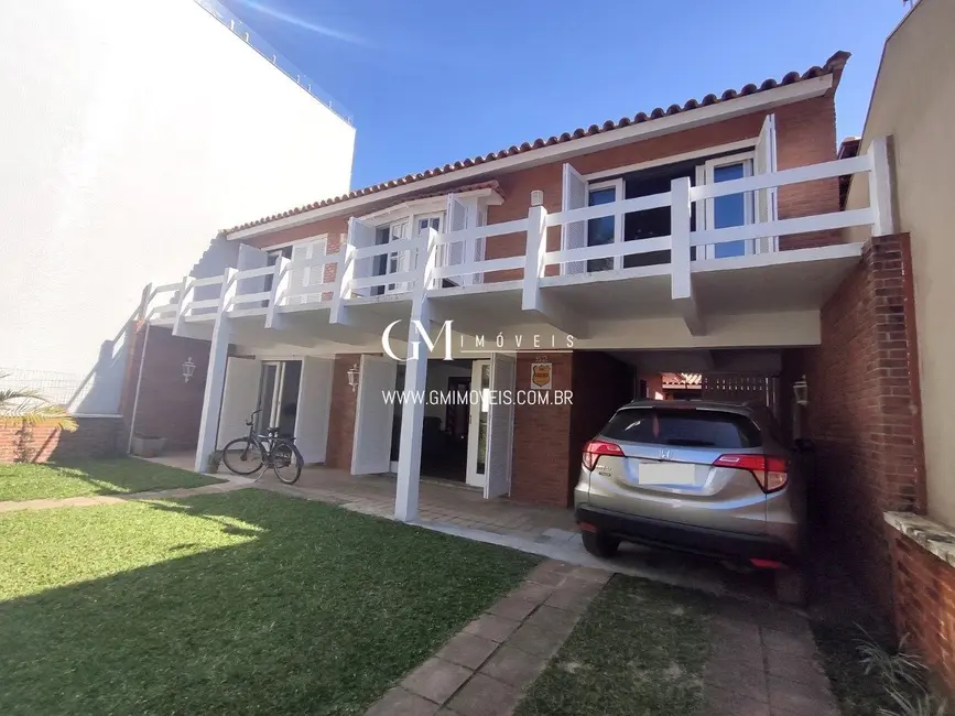 Foto 1 de Casa com 4 quartos à venda, 266m2 em Torres - RS