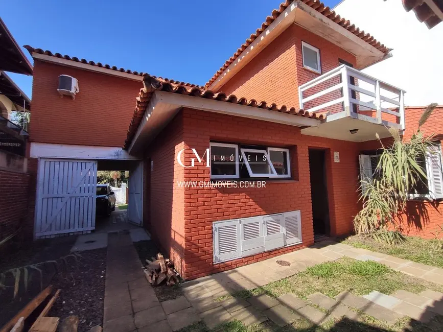 Foto 2 de Casa com 4 quartos à venda, 266m2 em Torres - RS