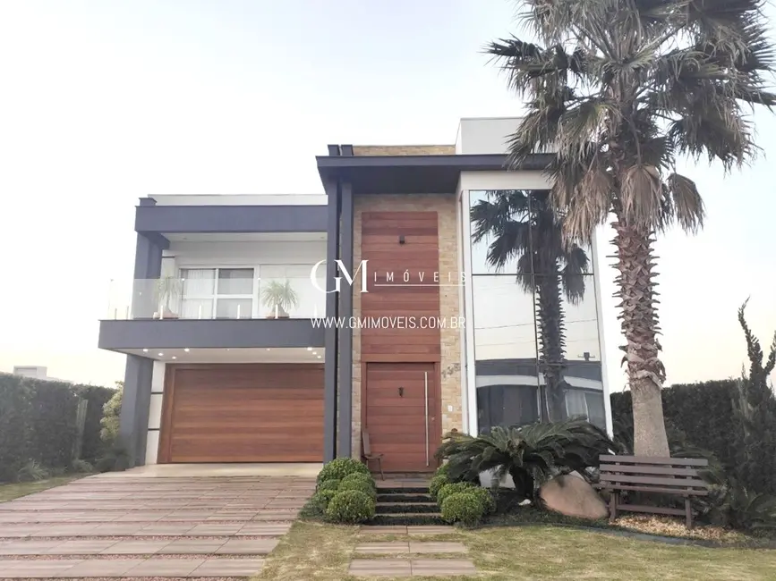 Casa de Condomínio com 5 quartos à venda, 330m2 em Torres - RS - imagem 2 Foto 2 de Casa de Condomínio com 5 quartos à venda, 330m2 em Torres - RS