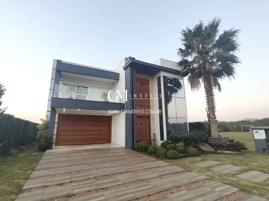 Casa de Condomínio com 5 quartos à venda, 330m2 em Torres - RS - imagem 4 Foto 4 de Casa de Condomínio com 5 quartos à venda, 330m2 em Torres - RS