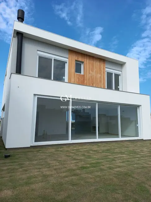 Casa de Condomínio com 4 quartos à venda, 330m2 em Torres - RS - imagem 3 Foto 3 de Casa de Condomínio com 4 quartos à venda, 330m2 em Torres - RS