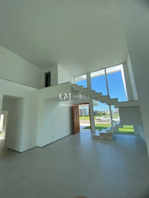 Casa de Condomínio com 4 quartos à venda, 330m2 em Torres - RS - imagem 2 Foto 2 de Casa de Condomínio com 4 quartos à venda, 330m2 em Torres - RS