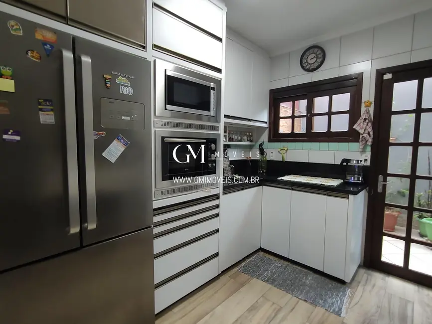 Casa com 3 quartos à venda, 132m2 em Torres - RS - imagem 8 Foto 8 de Casa com 3 quartos à venda, 132m2 em Torres - RS