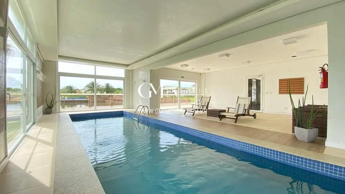 Foto 6 de Terreno / Lote à venda, 420m2 em Torres - RS