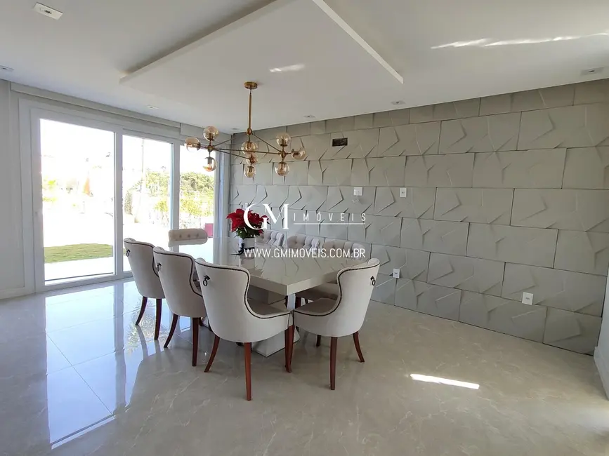 Casa de Condomínio com 4 quartos à venda, 377m2 em Torres - RS - imagem 7 Foto 7 de Casa de Condomínio com 4 quartos à venda, 377m2 em Torres - RS