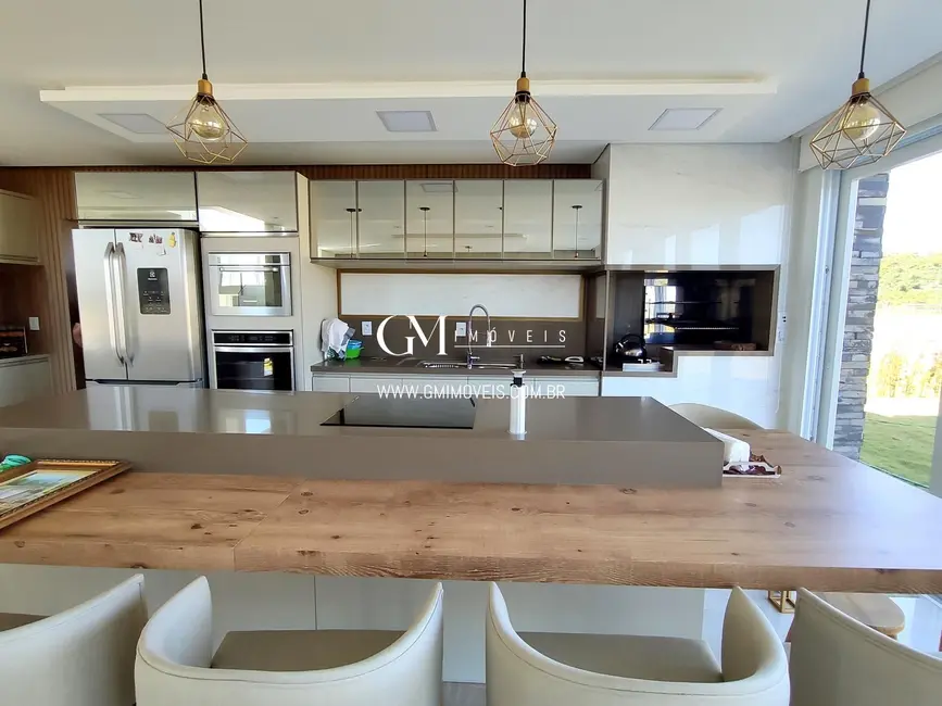 Casa de Condomínio com 4 quartos à venda, 377m2 em Torres - RS - imagem 4 Foto 4 de Casa de Condomínio com 4 quartos à venda, 377m2 em Torres - RS