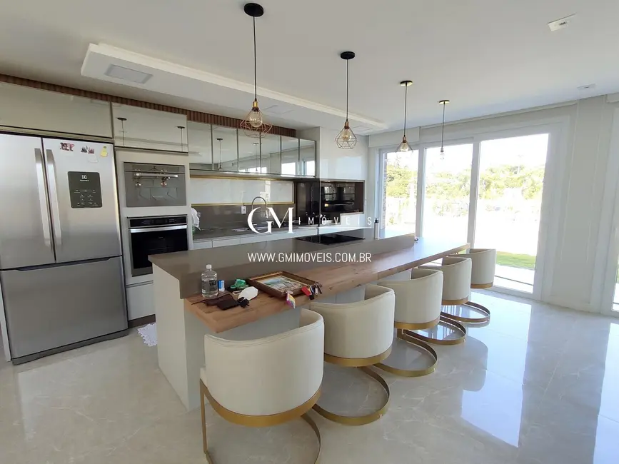 Casa de Condomínio com 4 quartos à venda, 377m2 em Torres - RS - imagem 3 Foto 3 de Casa de Condomínio com 4 quartos à venda, 377m2 em Torres - RS