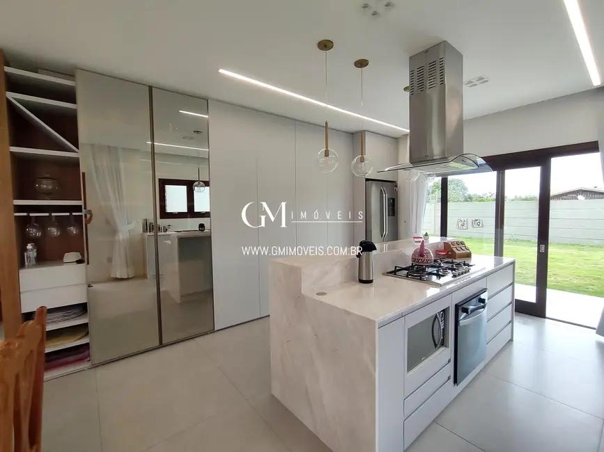 Foto 5 de Casa de Condomínio com 4 quartos à venda, 310m2 em Torres - RS