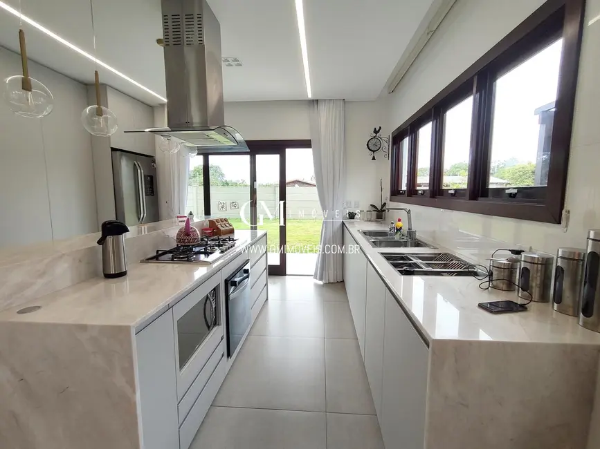 Foto 6 de Casa de Condomínio com 4 quartos à venda, 310m2 em Torres - RS