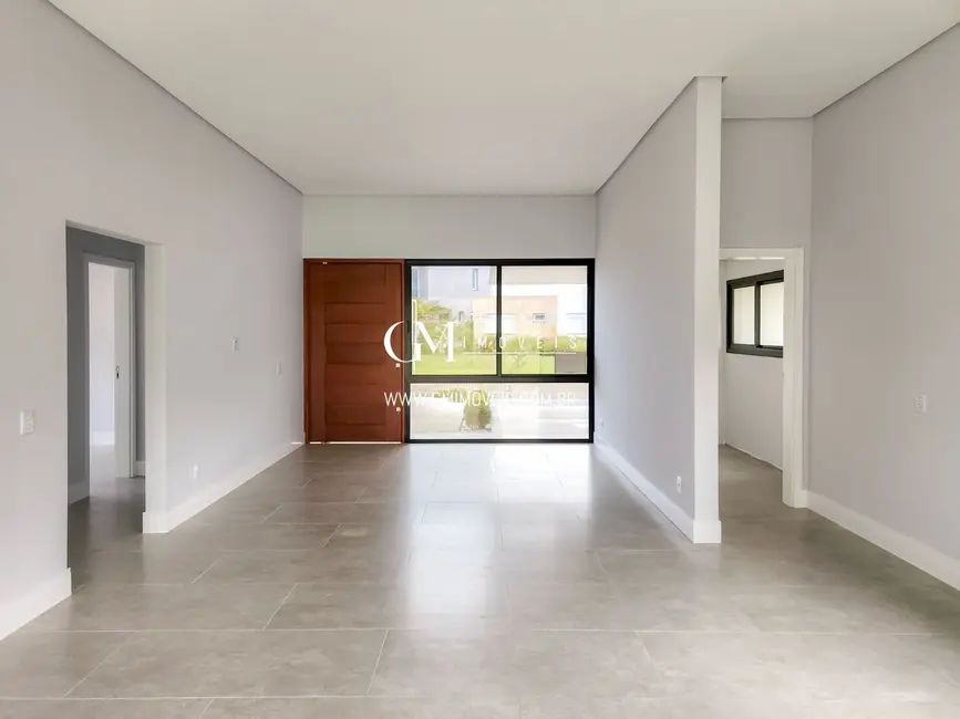 Casa de Condomínio com 3 quartos à venda, 216m2 em Torres - RS - imagem 7 Foto 7 de Casa de Condomínio com 3 quartos à venda, 216m2 em Torres - RS