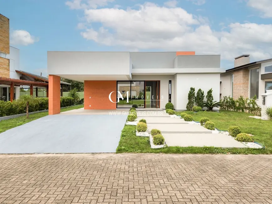 Casa de Condomínio com 3 quartos à venda, 216m2 em Torres - RS - imagem 3 Foto 3 de Casa de Condomínio com 3 quartos à venda, 216m2 em Torres - RS