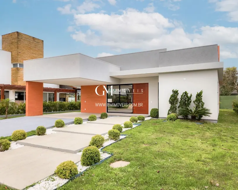 Casa de Condomínio com 3 quartos à venda, 216m2 em Torres - RS - imagem 5 Foto 5 de Casa de Condomínio com 3 quartos à venda, 216m2 em Torres - RS