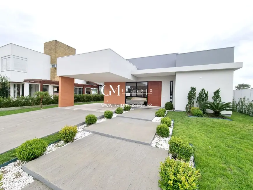 Casa de Condomínio com 3 quartos à venda, 216m2 em Torres - RS - imagem 6 Foto 6 de Casa de Condomínio com 3 quartos à venda, 216m2 em Torres - RS