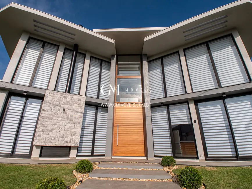 Casa de Condomínio com 5 quartos à venda, 457m2 em Torres - RS - imagem 4 Foto 4 de Casa de Condomínio com 5 quartos à venda, 457m2 em Torres - RS