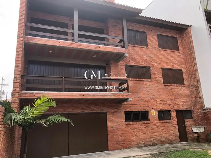 Foto 3 de Casa com 9 quartos à venda, 386m2 em Torres - RS