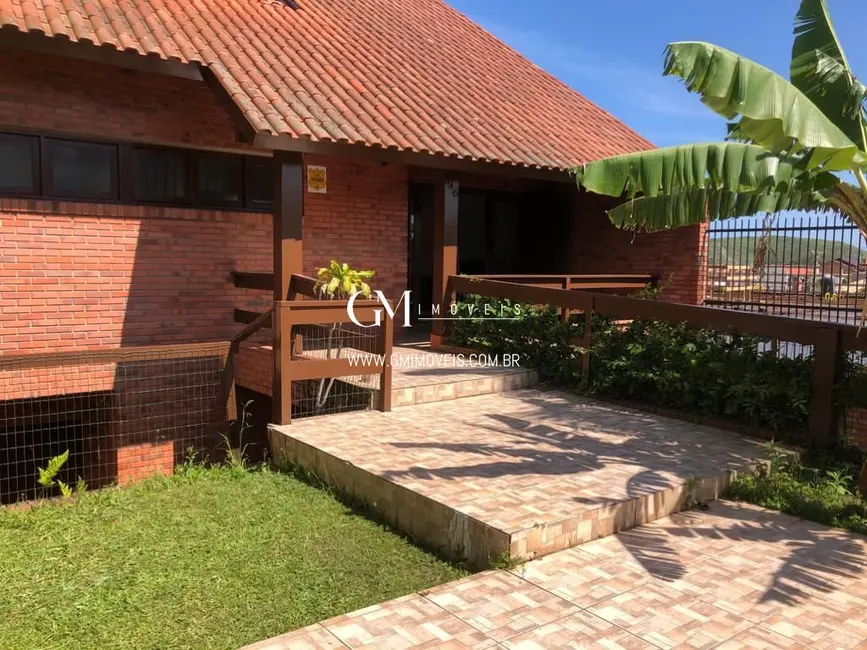 Foto 4 de Casa com 9 quartos à venda, 386m2 em Torres - RS