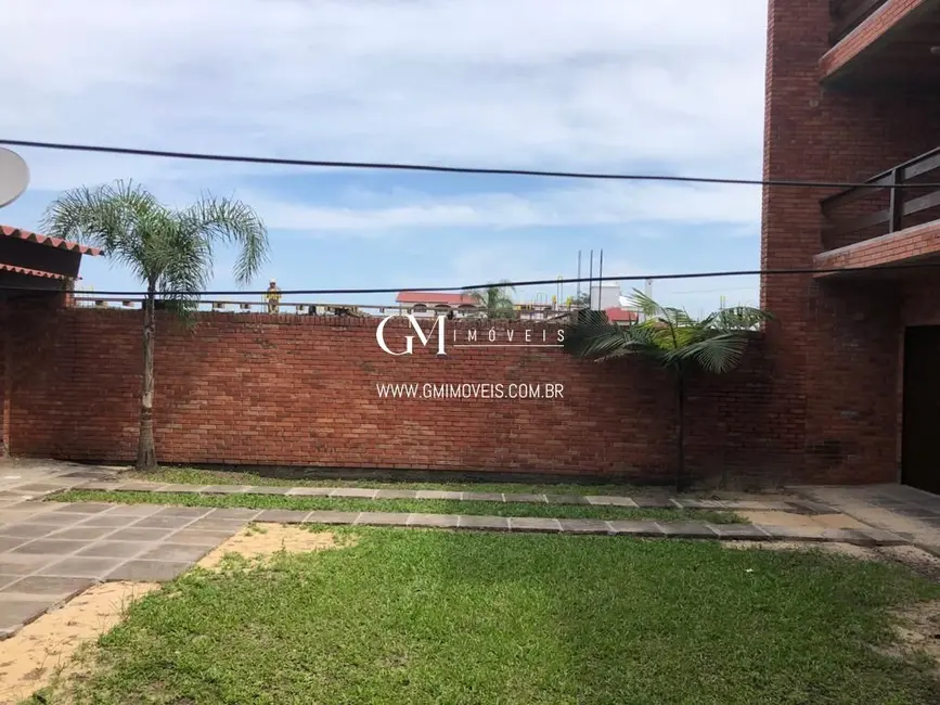 Foto 6 de Casa com 9 quartos à venda, 386m2 em Torres - RS