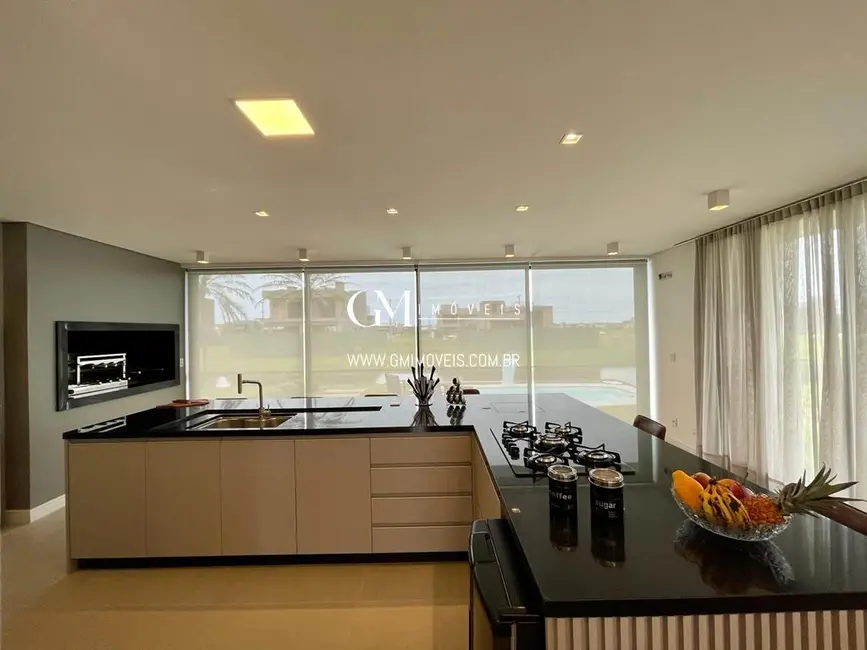 Casa de Condomínio com 3 quartos à venda, 211m2 em Torres - RS - imagem 6 Foto 6 de Casa de Condomínio com 3 quartos à venda, 211m2 em Torres - RS