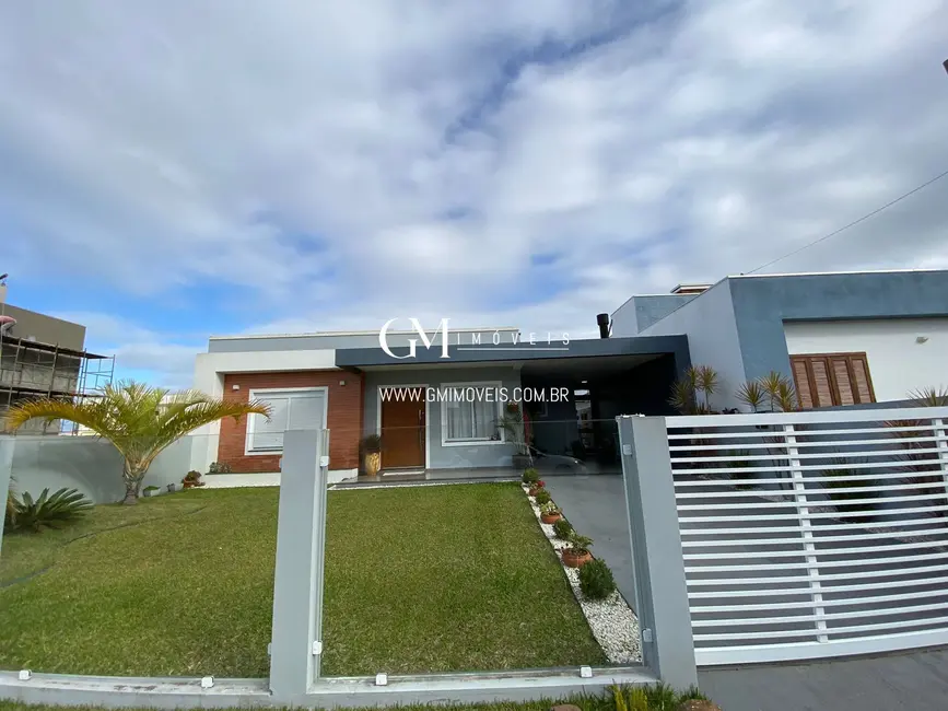 Casa com 2 quartos à venda, 120m2 em Torres - RS - imagem 1 Foto 1 de Casa com 2 quartos à venda, 120m2 em Torres - RS