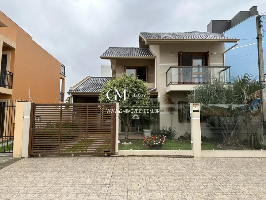 Foto 1 de Casa com 4 quartos à venda, 173m2 em Torres - RS