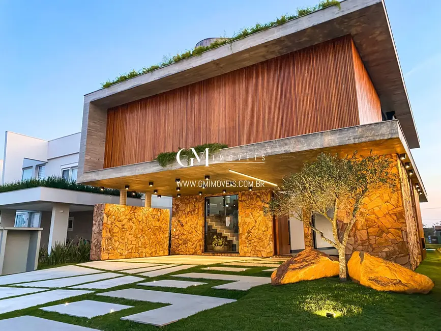 Foto 1 de Casa de Condomínio com 4 quartos à venda, 339m2 em Torres - RS