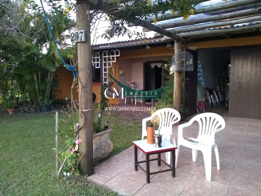 Casa com 3 quartos à venda, 110m2 em Torres - RS - imagem 1 Foto 1 de Casa com 3 quartos à venda, 110m2 em Torres - RS