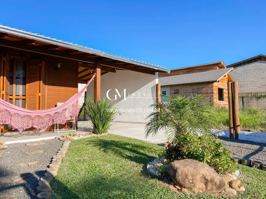 Foto 3 de Casa com 2 quartos à venda, 102m2 em Torres - RS