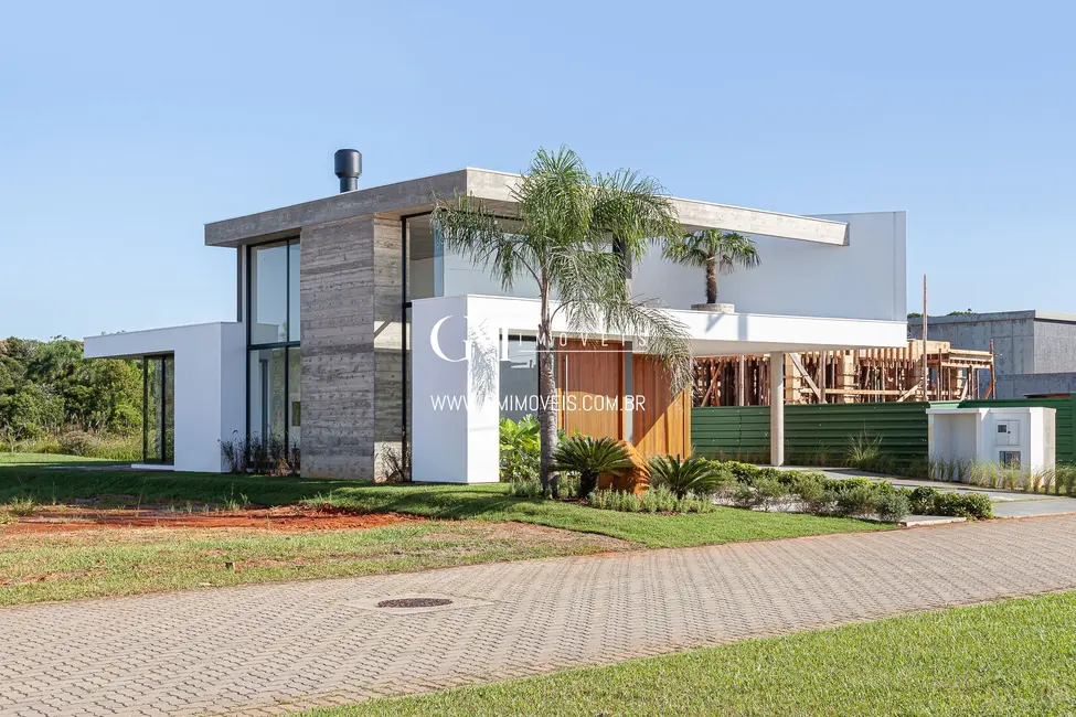 Casa de Condomínio com 3 quartos à venda, 204m2 em Torres - RS - imagem 4 Foto 4 de Casa de Condomínio com 3 quartos à venda, 204m2 em Torres - RS