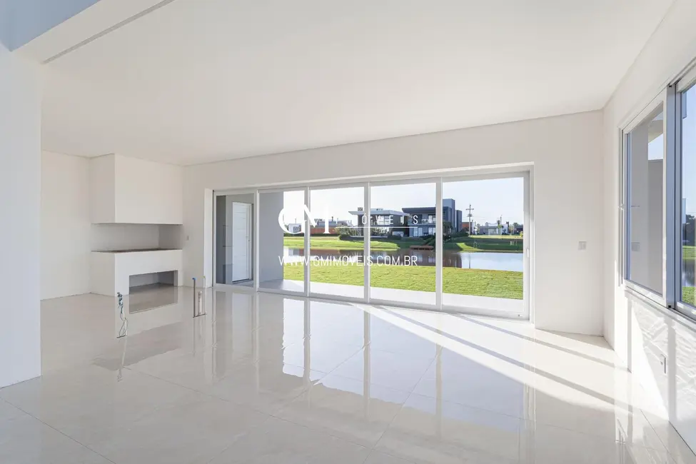 Foto 2 de Casa de Condomínio com 4 quartos à venda, 308m2 em Torres - RS